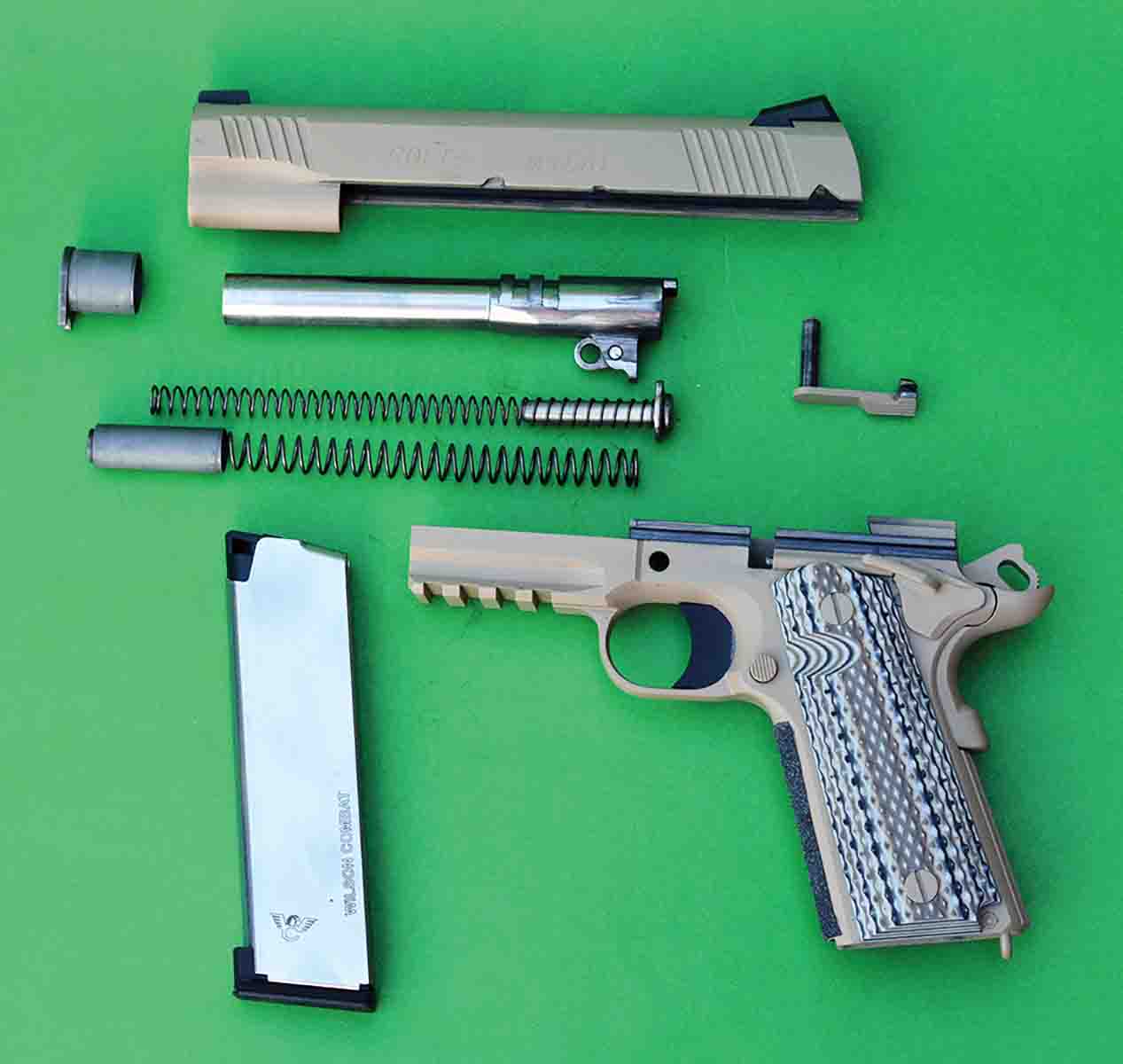 Colt manufactures almost all parts for the M45A1, which are either forged or machined from high-tensile steel. Note the double recoil springs.